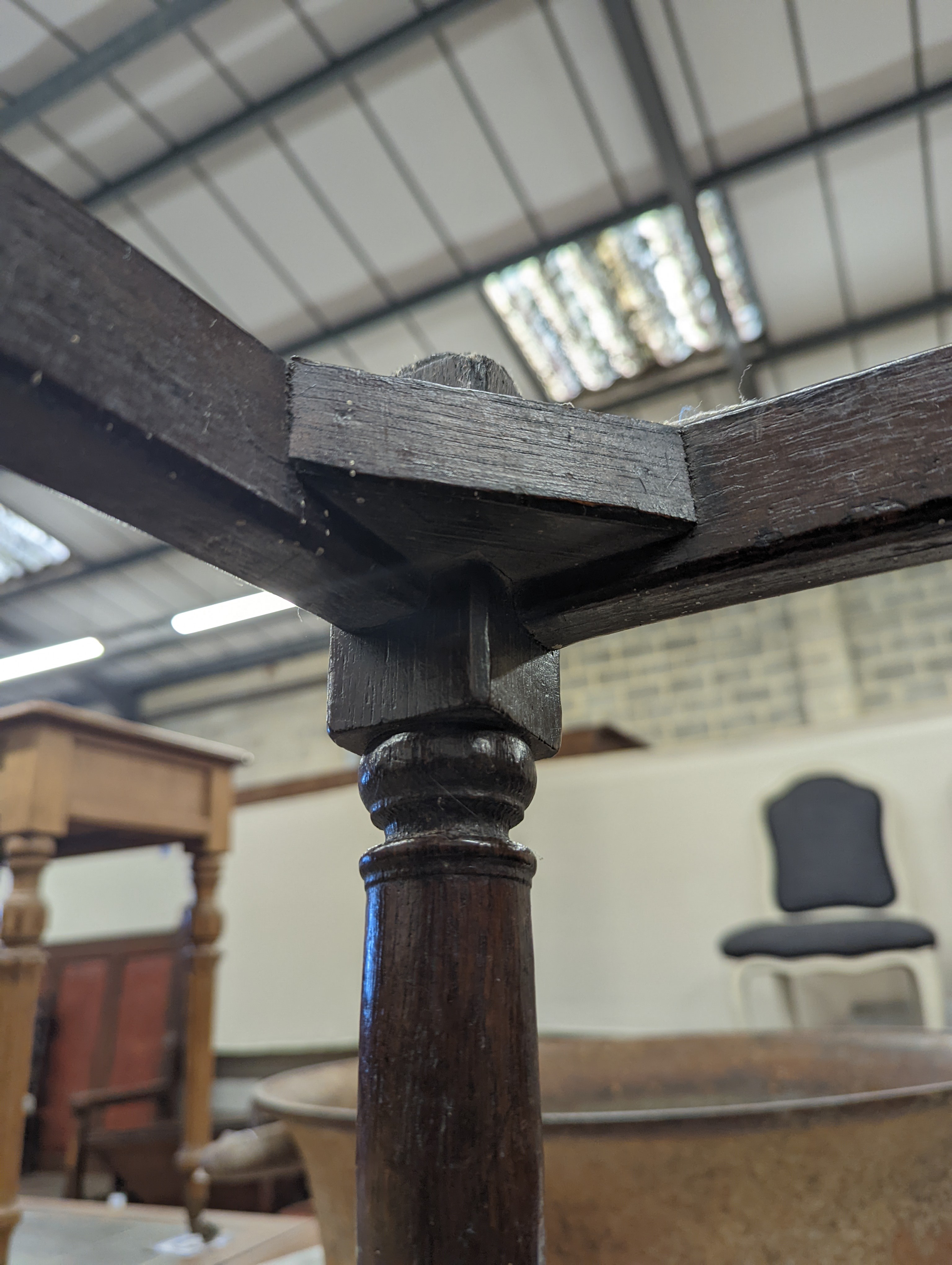 A 17th century style oak joint stool, width 46cm, depth 26cm, height 46cm and a George III stool with Victorian needlework seat, length 33cm